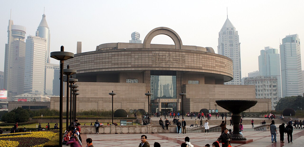 Shanghai Museum building at People's Square with visitors in front